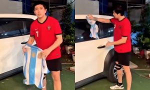 Ca sĩ Tim hứng chỉ trích dữ dội khi dùng áo của đội tuyển Argentina để lau xe