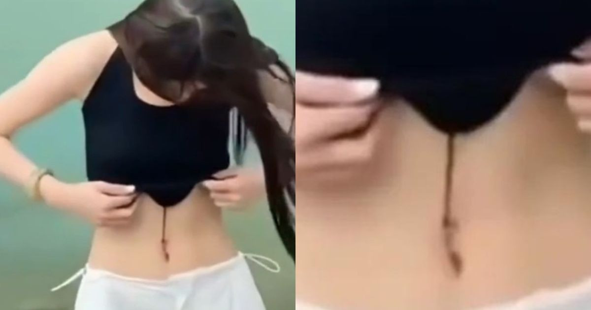 Khoe eo thon bên hồ, cô gái hồn bay phách lạc vì đỉa bám hút máu trên người